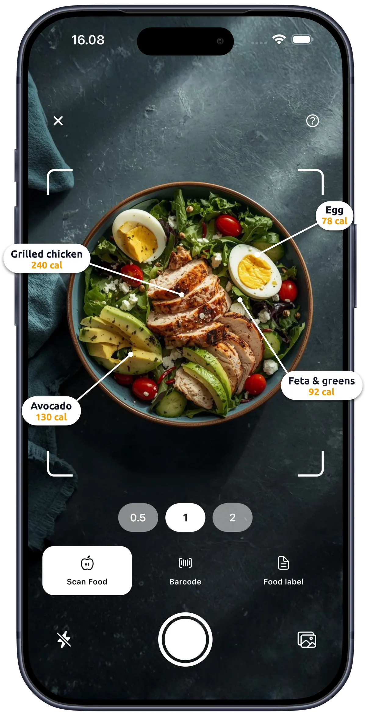Lorie scanning a grilled chicken salad, reading its ingredients